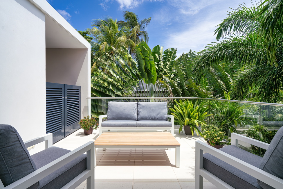 Open air terrace to maximize the Caribbean climate and entertaining from the covered terrace. Unit 14A pictured above.