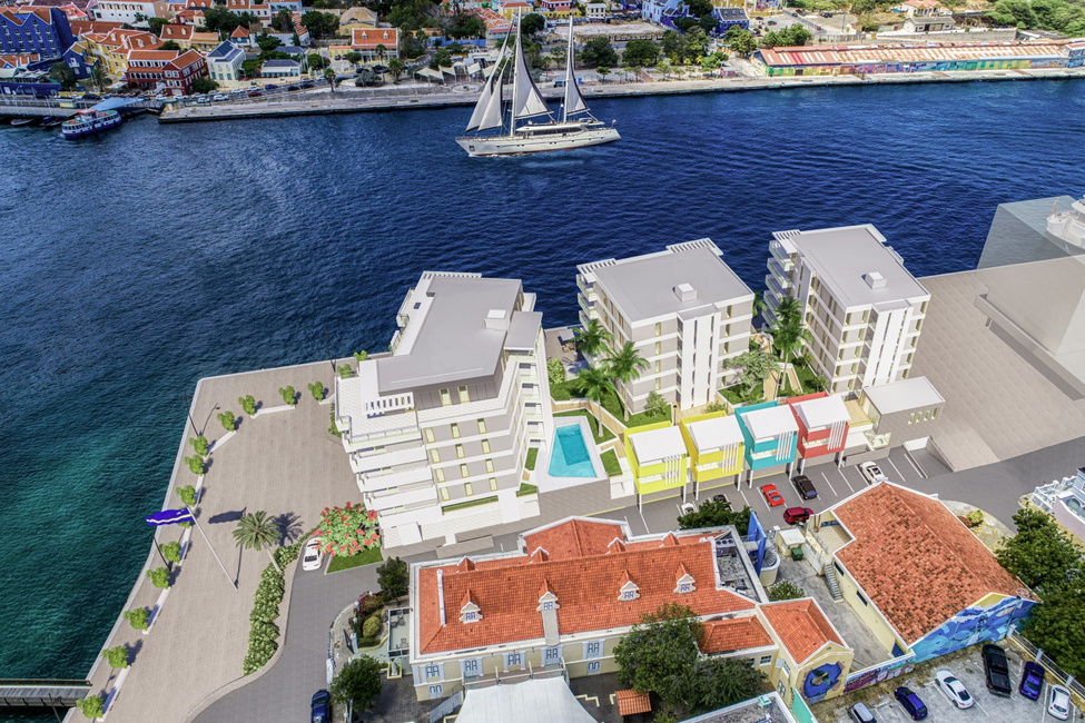 The Wharf and its colourful City Apartments which face the monuments of the historic Scharloo district.